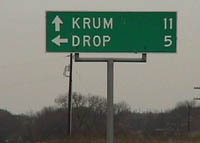 drop texas signpost