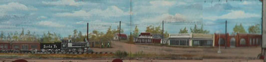 ponder texas steakhouse painted mural of main street as seen from across the tracks